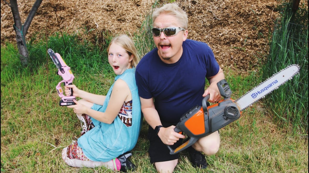 Barbie Pink Mini Chainsaw VS Husqvarna 120i Both Electric YouTube
